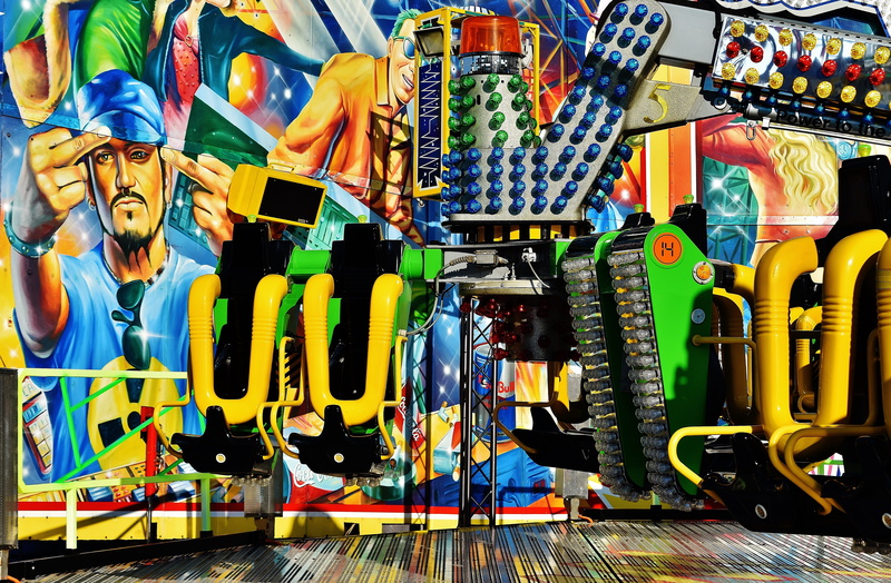 no people, large group of objects, fairground, full length, bavaria, yellow, for sale, carousel, Oktoberfest, male likeness, day, representation, choice