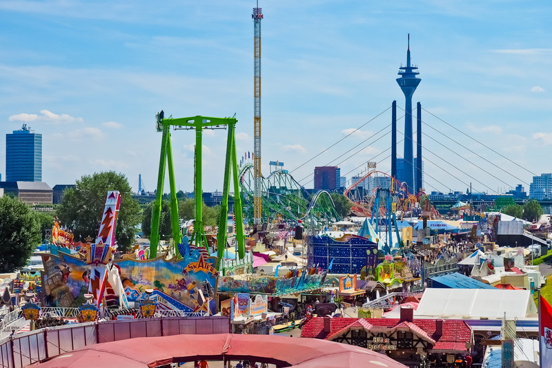 tall - high, ride, built structure, celebrate, nature, blue, pleasure, skyline, folk festival, bridge, building exterior, speed, hustle and bustle, entertainment