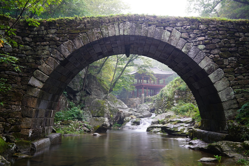 built structure, solid, day, culture, temple, scenery, rock - object, outdoors, korea, tourism, nature, arch, architecture, buddhism, no people, water