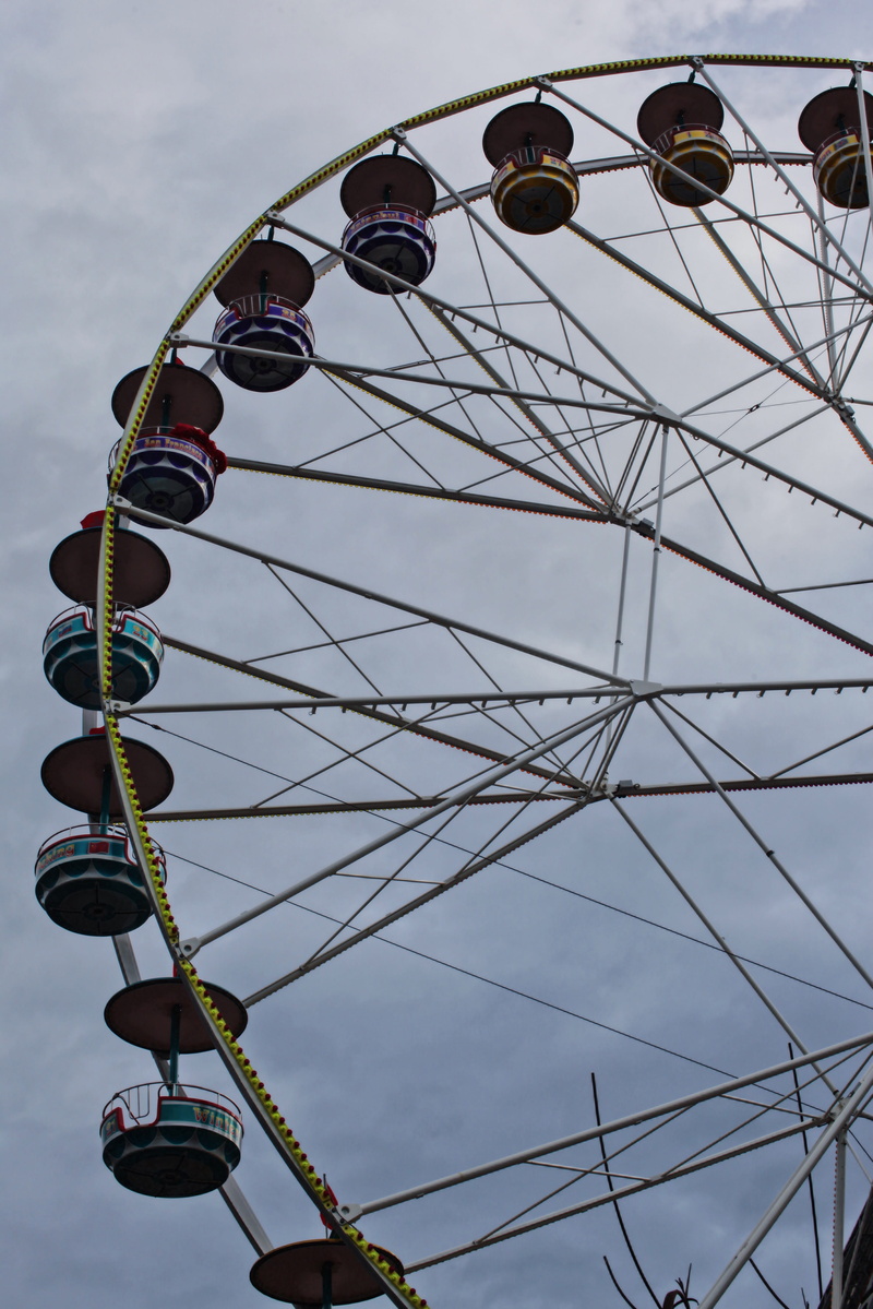 sky, wheel, amusement park, geometric shape, no people, outdoors, arts culture and entertainment, amusement park ride, activity, fairground, circle, shape