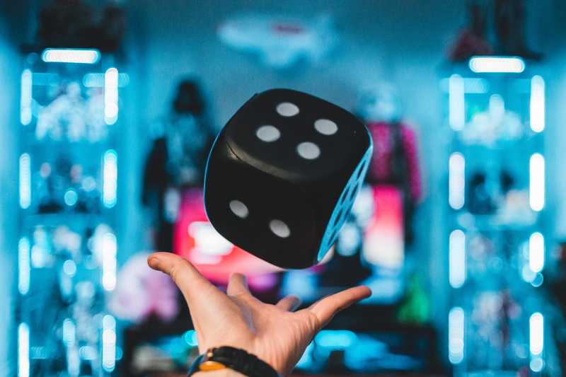 toy, mobile phone, real people, holding, focus on foreground, gambling, s, throw, game, lifestyles, person, one person, close-up, left, palm, hype, catch