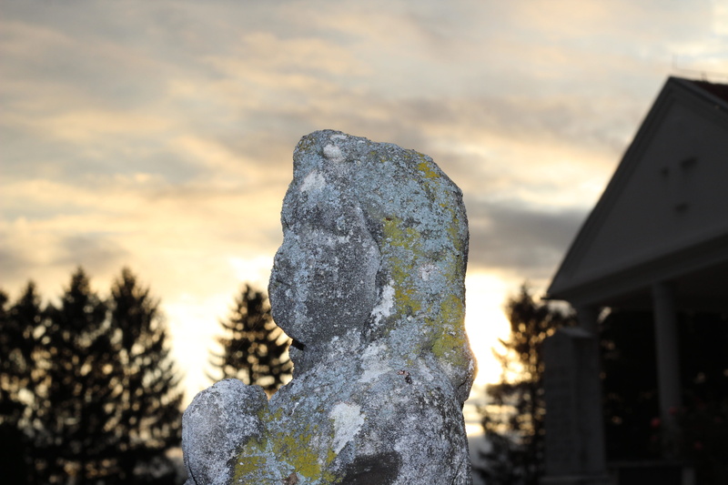 outdoors, no people, cold temperature, stone child monument, close-up, plant, winter, low angle view, heavy loss, sky, christian, sunset, architecture