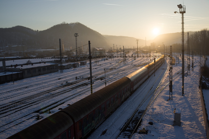 non-urban scene, rail transportation, winter, sadness, cold temperature, electricity, traveling, white color, in the evening, covering, no people, mountain