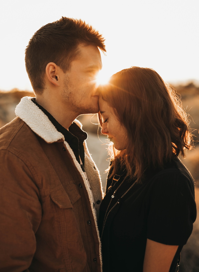two people, side view, men, sunlight, togetherness, lifestyles, kissing, young adult, girl, adult, hour, positive emotion, heterosexual couple, real people