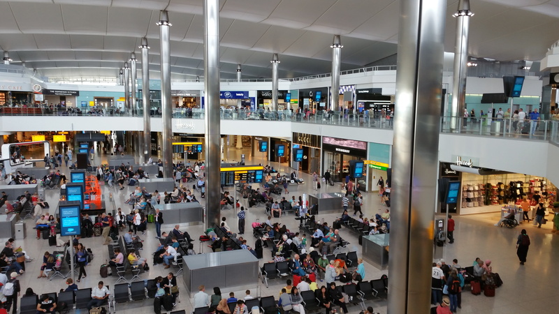 real people, adult, london, modern, uk, transportation, journey, lifestyles, interior, women, group of people, airport check-in counter, travel, britain