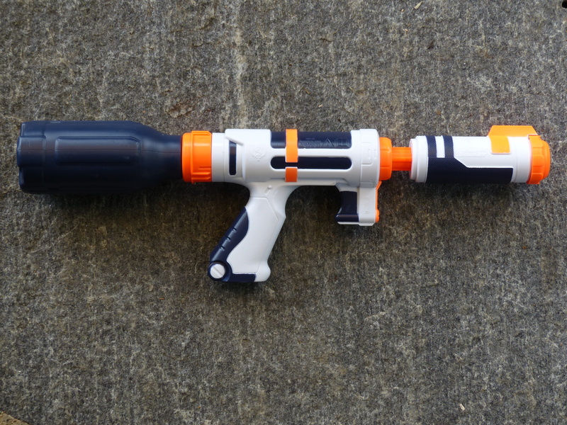 weapon, no people, communication, directly above, gun, outdoors, technology, close-up, 4K, plastic, still life, black, child, day, syringe, orange, play