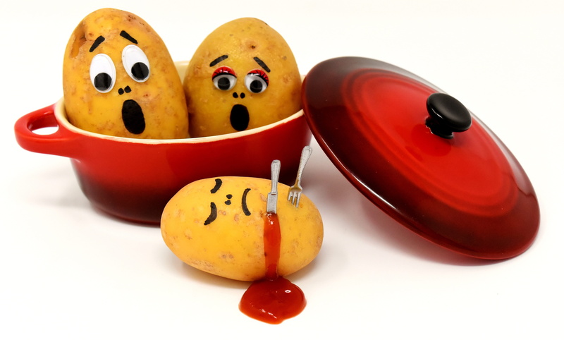 potatoes, wellbeing, face, no people, fruit, smiling, anthropomorphic smiley face, studio shot, art and craft, kill, fun, knife, potato murder, red, food and drink
