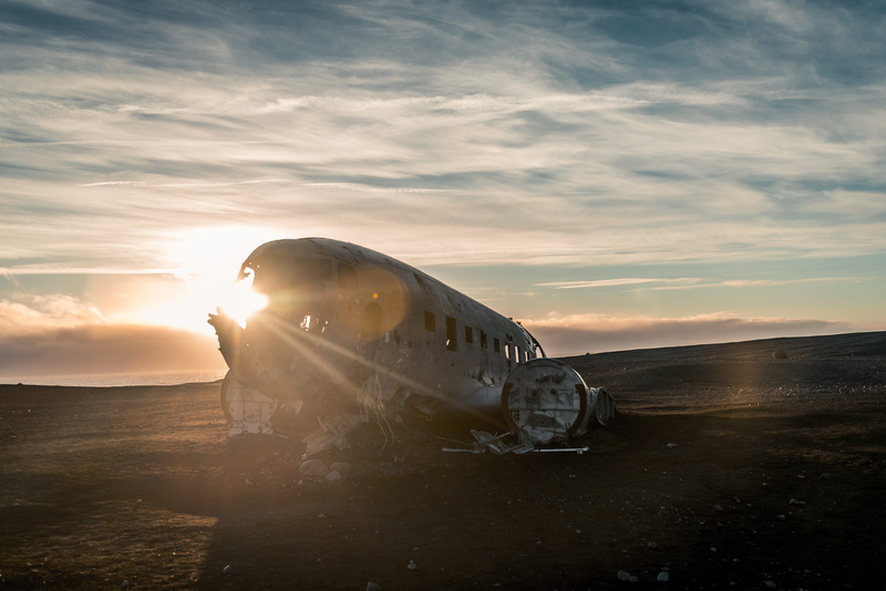 bright, crash, transportation, iceland, field, lens flare, sky, airplane, no people, sun, beauty in nature, sunbeam, damaged, air vehicle, cloud - sky