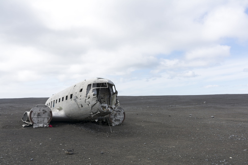 land, abandoned, sky, air vehicle, mode of transportation, climate, wreck, day, aerospace industry, environment, ruined, no people, horizon over land, 5K