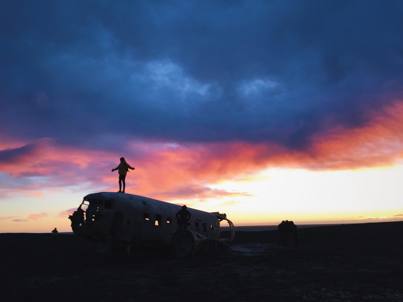 solheimasandur beach, transportation, landscape, mode of transportation, cloud, iceland, moody sky, sunlight, dramatic sky, person, cloud - sky, sunrise
