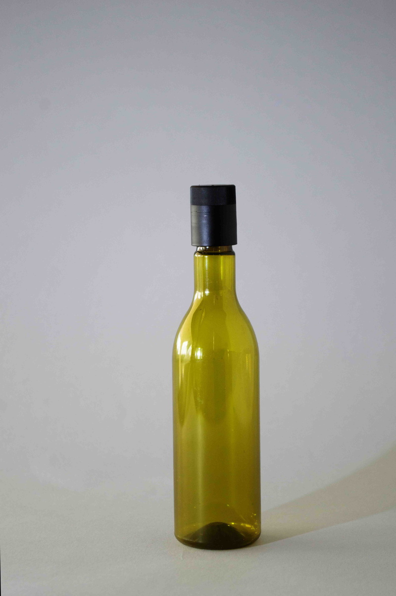 cork - stopper, transparent, still life, cap, no people, food and drink, glass - material, single object, container, pet, product photography, indoors