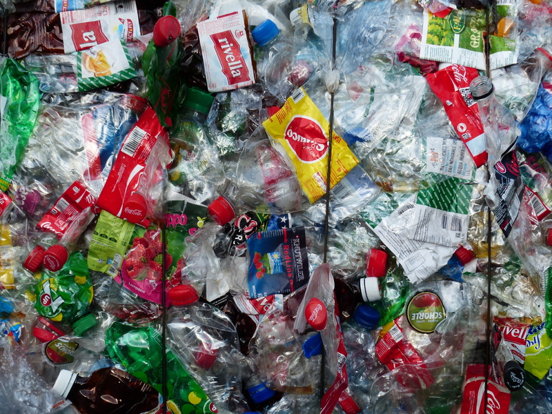 consumerism, plastic bottles, bottles, choice, communication, packs, indoors, large group of objects, abundance, plastic bag, for sale, no people, cube
