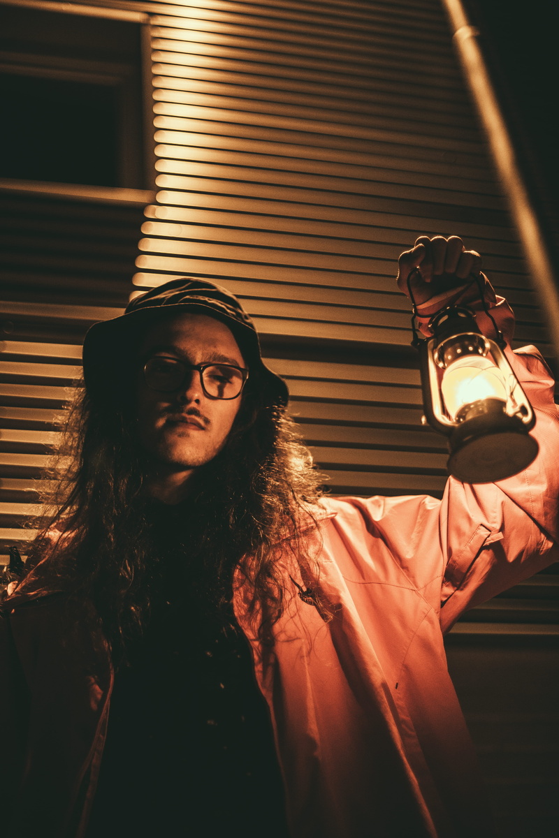 young Adult, males, party - Social Event, one Person, dark, happiness, copy Space, evening, light, adult, indoors, holding, long hair, male, outdoors, lifestyles