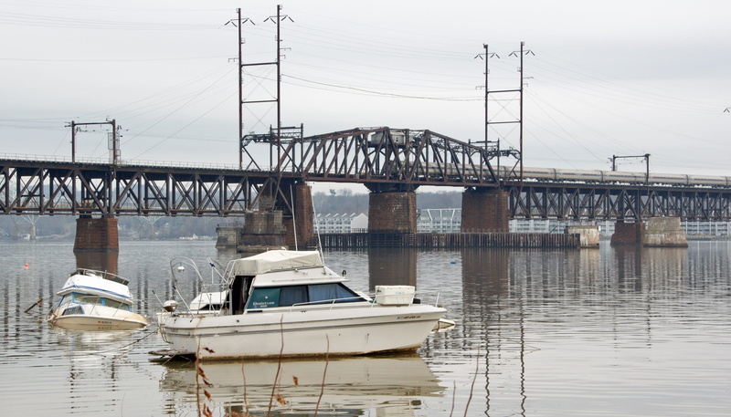 sea, travel destinations, train bridge, architecture, outdoors, nature, water, boats, boat images, river, mode of transportation, day, river pictures, storm damage