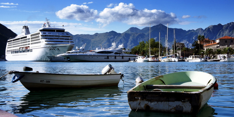 sailboat, mode of transportation, architecture, anchored, travel, waterfront, boat, tourism, moored, montenegro, ship, clouds, building exterior, water