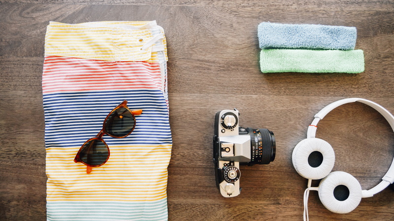indoors, camera - photographic equipment, striped, technology, flat, still life, knolling - concept, trip, music, entertainment, lay, table, directly above