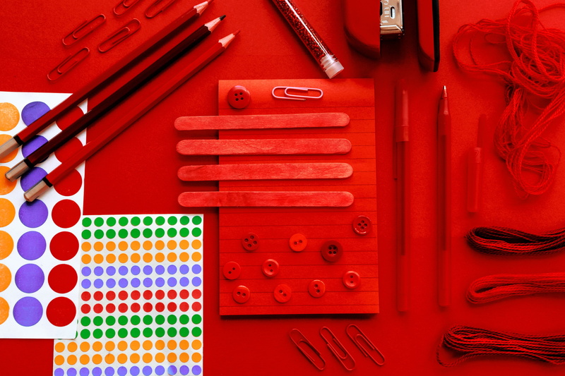 image, photography, choice, complexity, group, indoors, art, pens, design, red, art materials, in a row, creativity, directly above, still life, flat, plastic