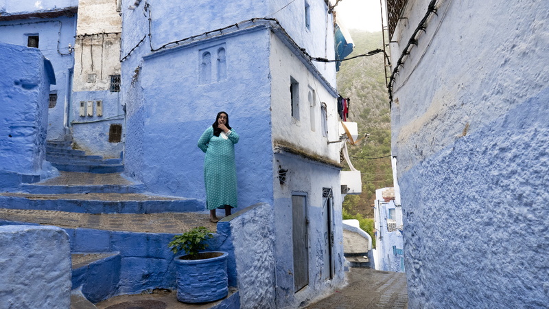 stairs, human representation, beside, standing, nature, path, fashion, home decor, real people, walkway, window, woman, alley, plant, residential district