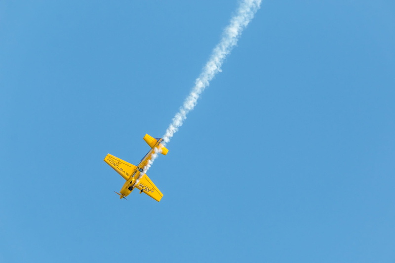 plane, aircraft, sky, no people, transportation, day, flying, airshow, extra 300, airplane, outdoors, sunny, aerospace industry, motion, history, entertainment event