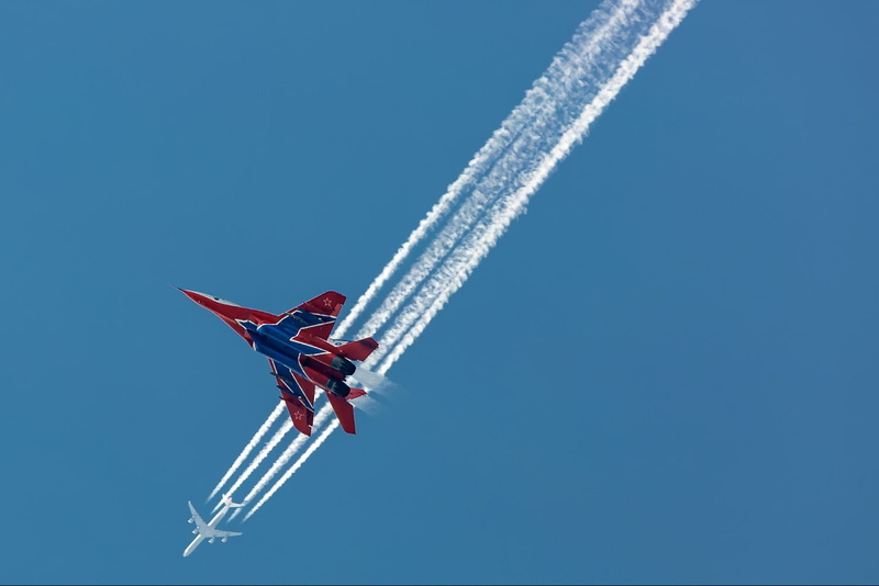 aircraft, mode of transportation, airplane, vehicle, flying, air vehicle, day, smoke - physical structure, clear sky, mig-29, outdoors, sunny, sky, vapor trail