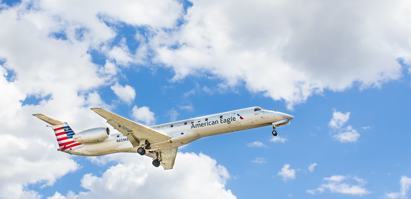 mississauga, bombardier, transportation, outdoors, flying, fighter plane, clouds, cloud - sky, air vehicle, nature, blue sky, aviation, american airlines