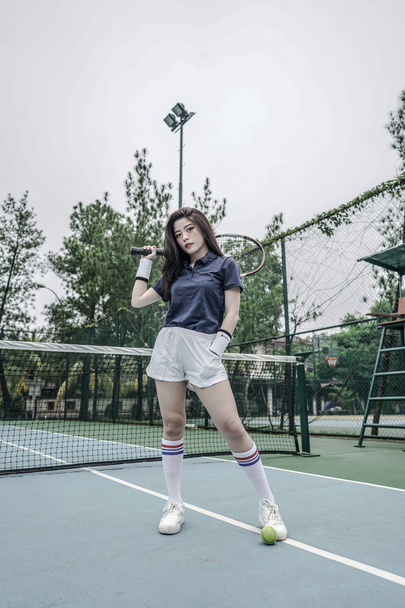 badminton, lifestyles, outdoors, court, tennis, tree, childhood, racket, casual clothing, sport, 8K, holding, ball, teenager, pre-adolescent child, one person