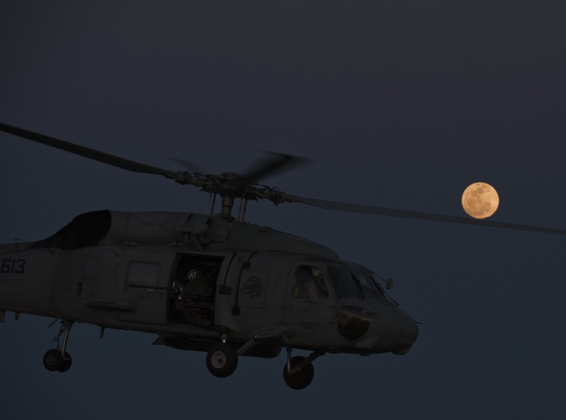 low angle view, clear sky, airplane, launches, deck, Moon, armed forces, mid-air, Helicopter, air vehicle, transportation, outdoors, government, mode of transportation