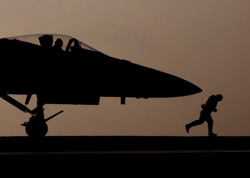 flight deck, plane, full length, military, naval, crew, outdoors, nature, aircraft, clear sky, sky, government, men, people, dusk, silhouette, f-18, shadow