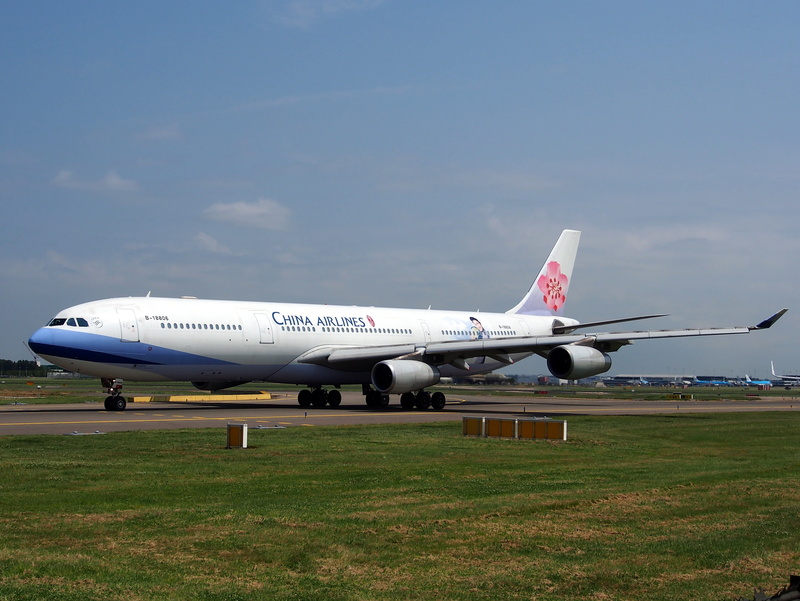 travel, side view, stationary, cloud - sky, flying, transportation, no people, airport runway, aviation, sky, airbus a340, taxiing, arrival, plane, commercial airplane