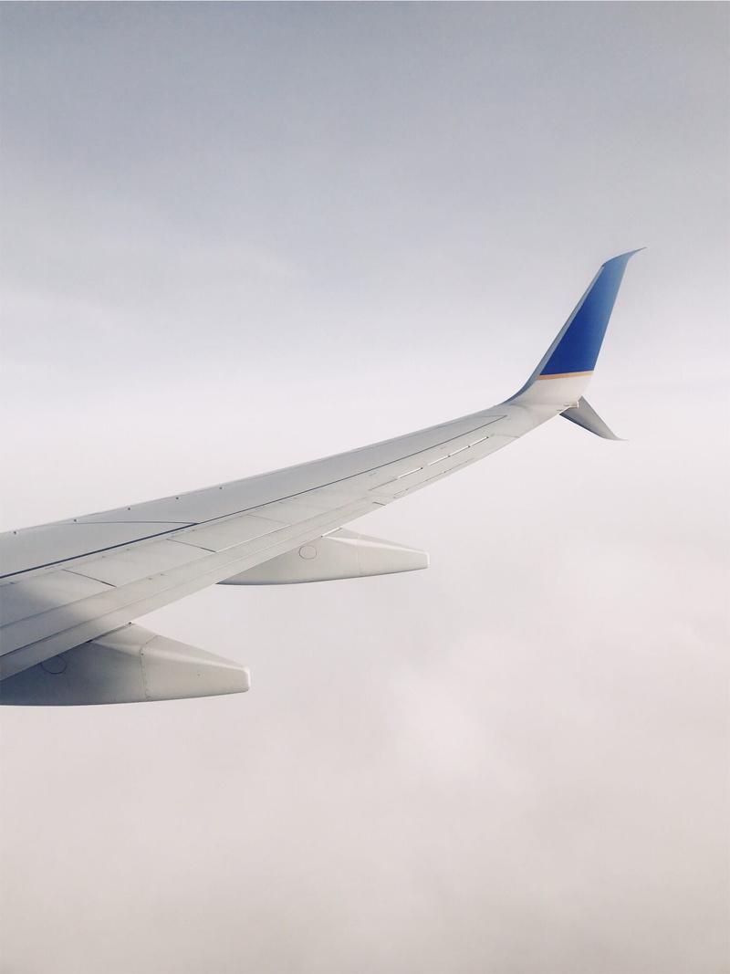 day, aircraft Wing, white, no people, environment, mode of transportation, commercial Airplane, sky, copy space, airplane, clouds, air Vehicle, blue, journey