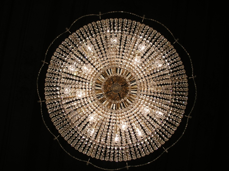 rotunda, circle, shape, ceiling, luxury, electricity, art and craft, light fixture, lighting, dark, hanging, the ceiling of the, low angle view, studio shot
