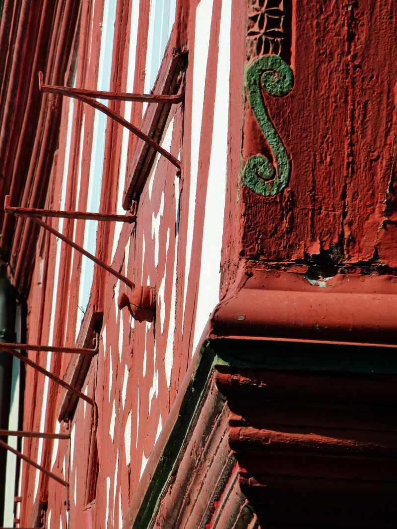 weathered, fachwerkhaus, metal, built structure, outdoors, red, day, wooden beams, gable, old town, old, truss, no people, staircase, sunlight, facade