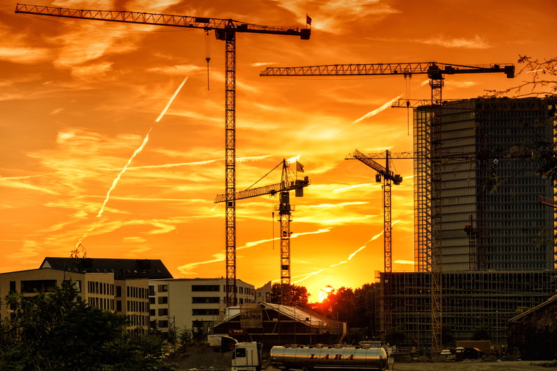 orange color, industry, sunlight, building exterior, nature, city, construction, house, baukran, development, built structure, construction equipment, no people