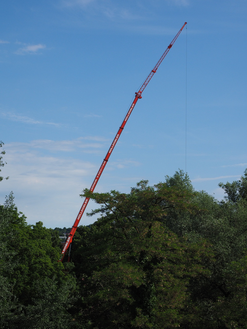 non-urban scene, crane, equipment, green color, construction equipment, boom, tranquility, telescopic arms, beauty in nature, day, load crane, sky, cloud - sky