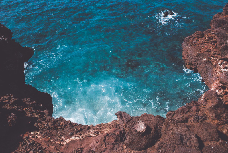 rock formation, beauty in nature, waves, earth, beach, rock - object, hawaii, power in nature, 4K, outdoors, scenics - nature, high angle view, water