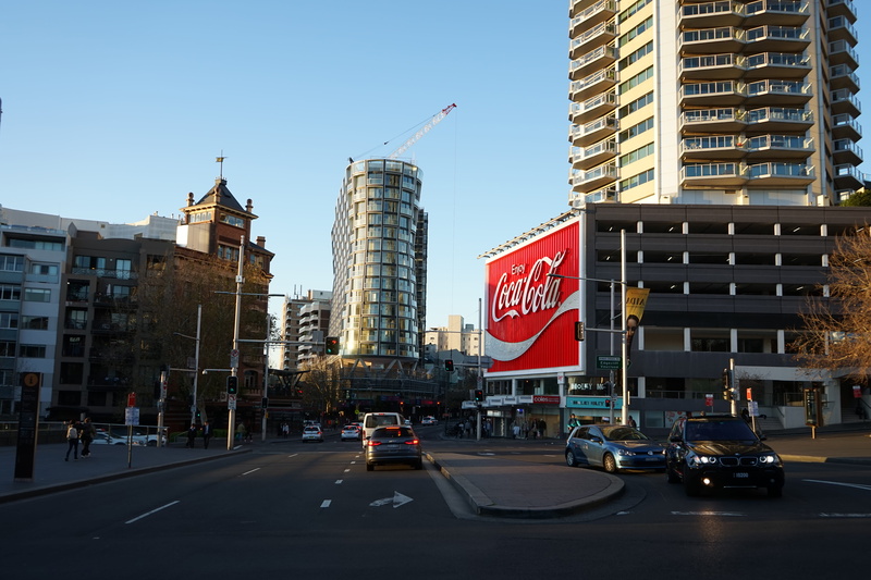 city, communication, 5K, day, gentrification, building exterior, modern, sky, sign, land vehicle, text, sydney, transportation, street, kings cross, motor vehicle