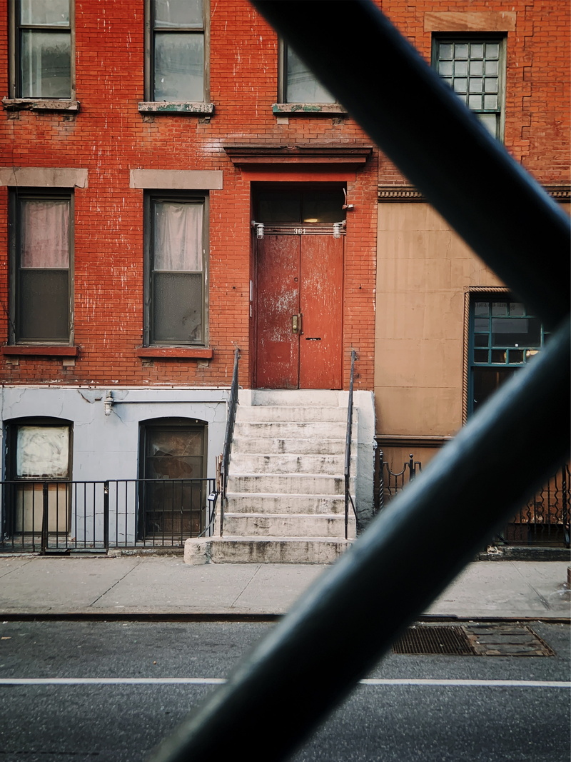 outdoors, staircase, door, glass - material, curtain, asphalt, new york, brick, metal, city, walkway, pavement, built structure, building, wall - building feature