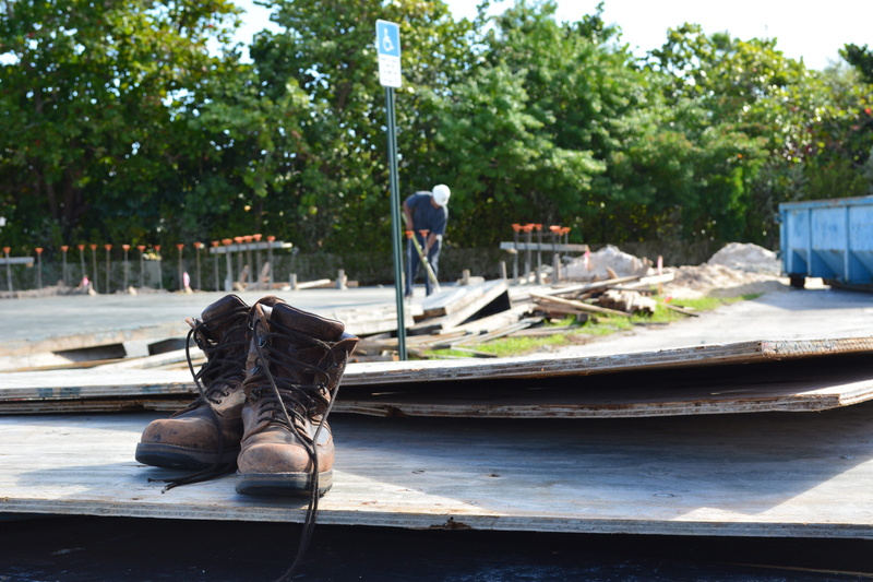full length, water, wood - material, job site, incidental people, outdoors, laborer, tree, nautical vessel, occupation, focus on foreground, mode of transportation
