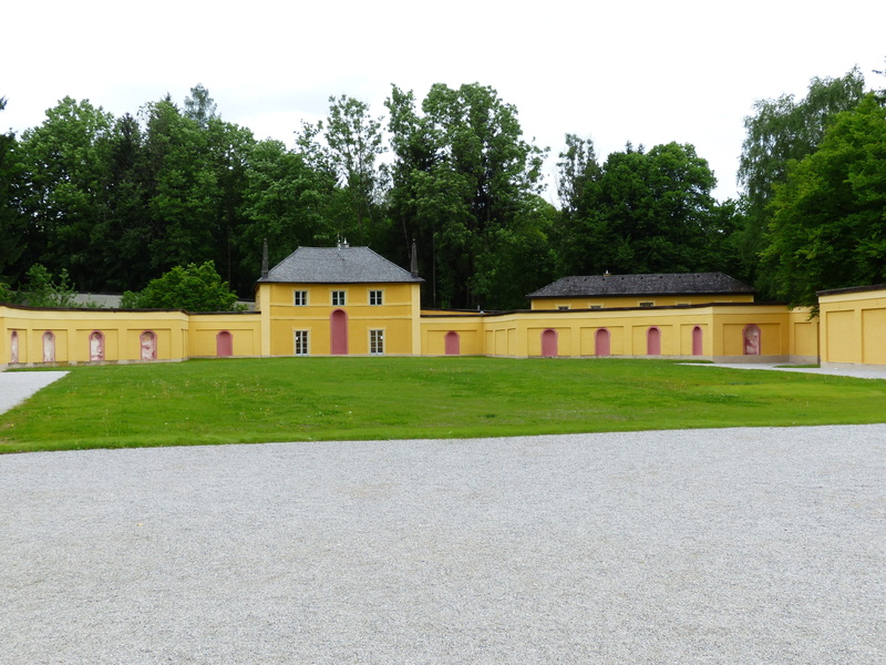 field, no people, mannerism, fence, grass, lawn, day, outdoors, stables, building, barrier, hellbrunn, building exterior, green color, 4K, Schloss Hellbrunn
