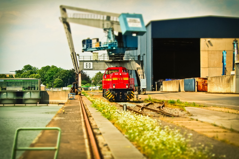 harbour crane, land vehicle, rail transportation, track, harbour cranes, locomotive, architecture, travel, tilt shift, loading crane, no people, mode of transportation