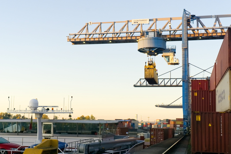 loading, machinery, mode of transportation, pier, cargo, cargo container, company, development, container handling, no people, container, nautical vessel