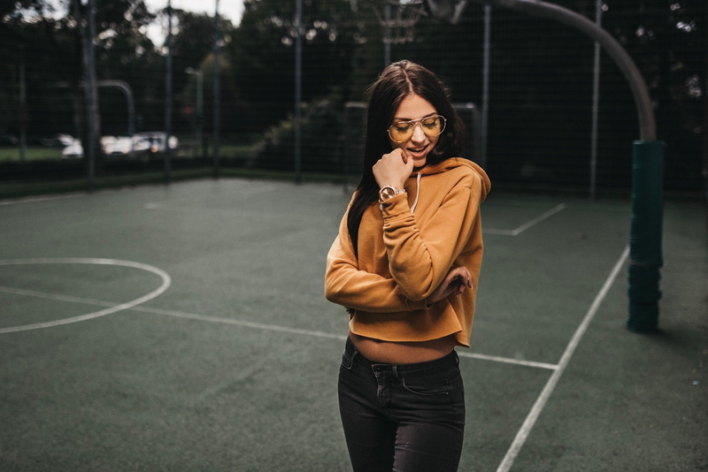 sweater, depth of field, women with glasses, 1080P, portrait, jeans, women outdoors, basketball court, smiling, women, closed eyes