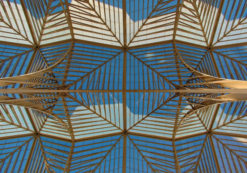 glass, geometric shape, clear sky, low angle view, structure, full frame, train, steel, beam, design, no people, day, column, sky, station, directly below