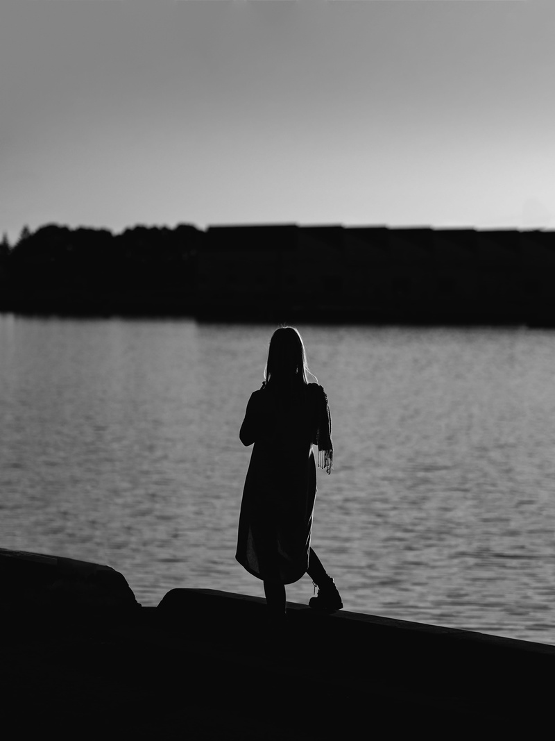 relaxing, silhouette, portrait, leisure activity, women, ocean, outdoors, meditate, shapes, standing, water, explore, looking at view, real people, simplicity