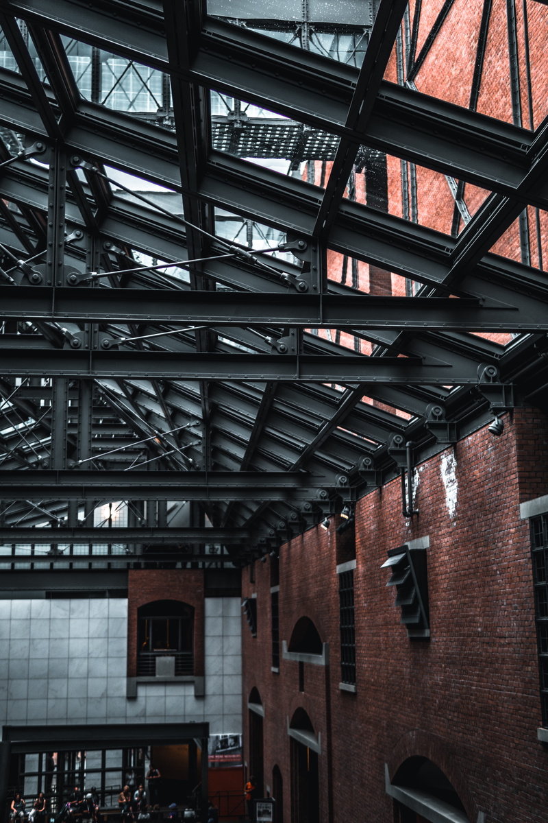 interior, red, indoors, window, built structure, sunlight, iron, brick, low angle view, roof beam, roof, architecture, structure, gray, frame, building