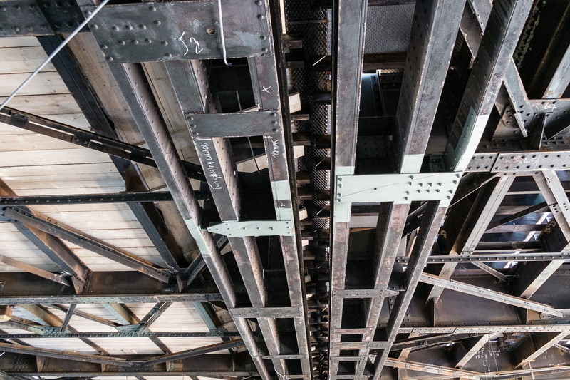architecture, low angle view, full frame, text, road, bridge, girder, metal, industry, development, construction Industry, underground, day, tram, ubahn