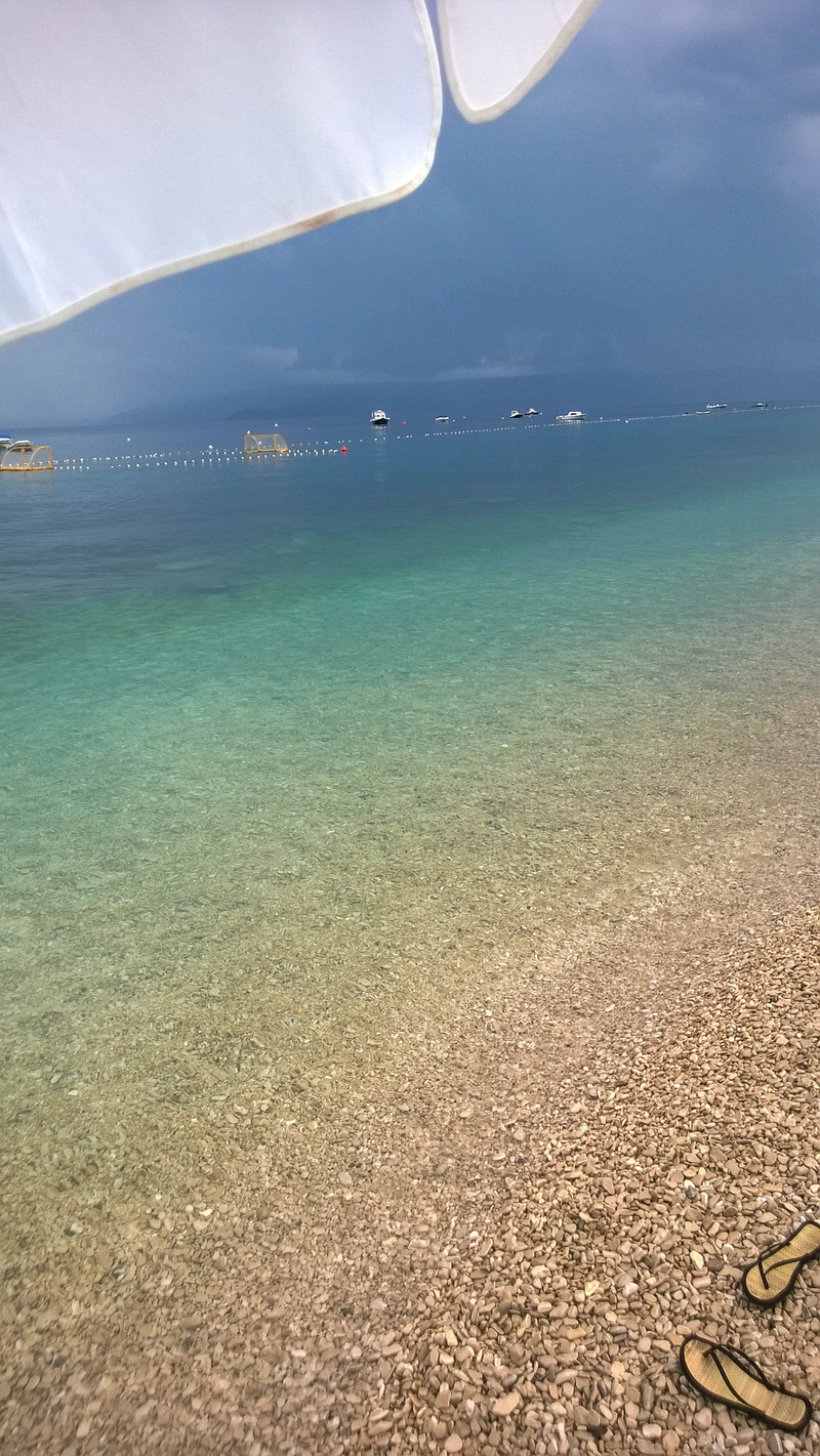 cloud - sky, idyllic, beauty in nature, sky, sand, blue water, horizon, day, sandals, horizon over water, tranquility, holiday, summer, land, no people