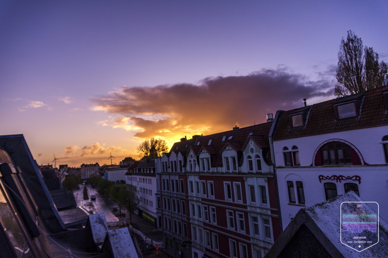 sunset, morning, watermarked, mode of transportation, building, sky, residential district, city life, architecture, city, town, vintage, high angle view