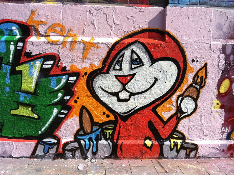 wall - building feature, built structure, text, wall, multi colored, art and craft, rudeness, day, hare, art, no people, craft, architecture, creativity