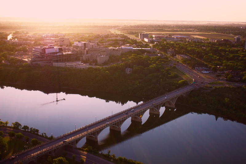 high angle view, building, outdoors, saskatoon, connection, cityscape, sky, reflection, canada, bridge, city river bridges sunrise, city, built structure